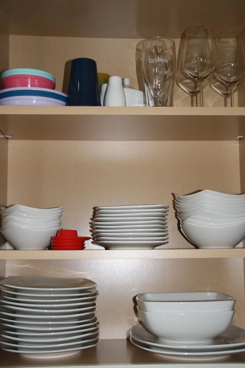 Fully stocked dishware cabinet