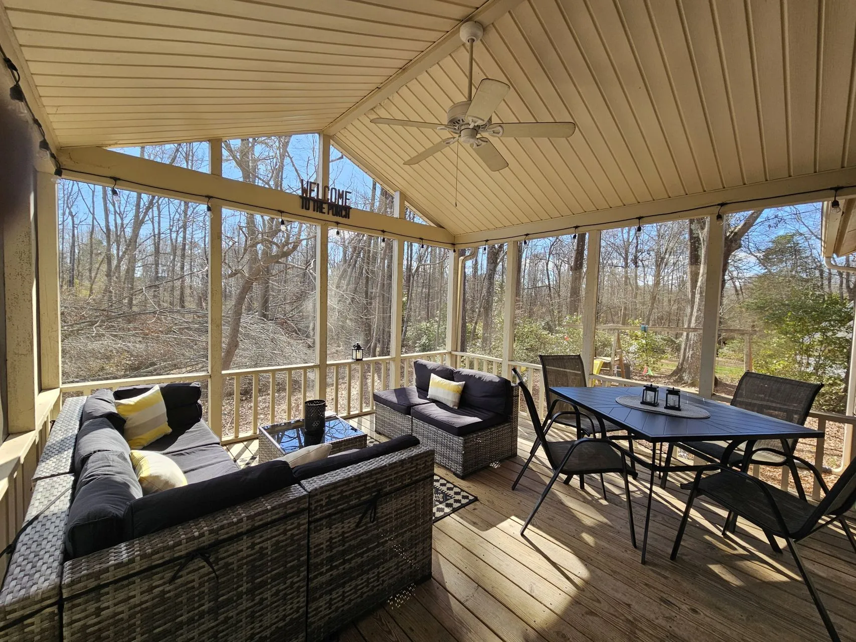 Screened porch with comfortable seating area